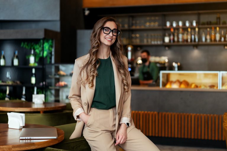 Business Woman Restaurant Owner Dressed Elegant Pantsuit Standing In Restaurant With Bar Counter